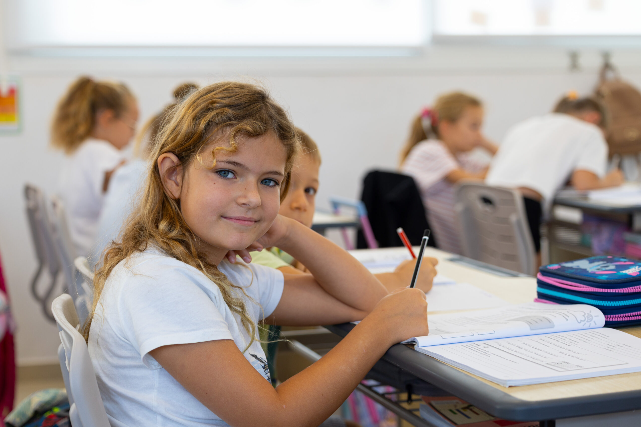 Students studying in a Cambridge International classroom at Golden Oak School in Limassol Cyprus focusing on creativity and critical thinking