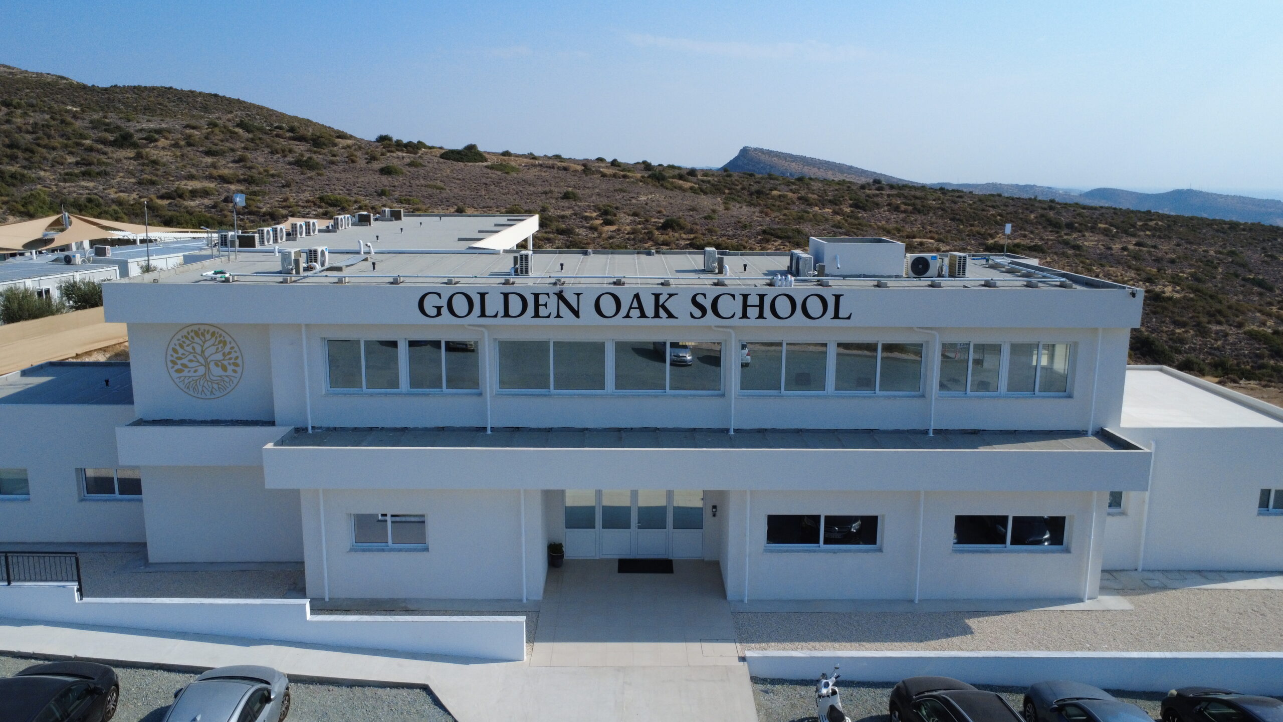 Modern exterior of Golden Oak Private School in Limassol Cyprus featuring bright welcoming architecture and a safe learning environment