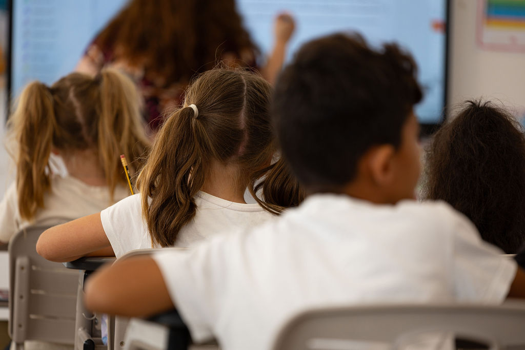 Pupils seated together during a lesson at Golden Oak.